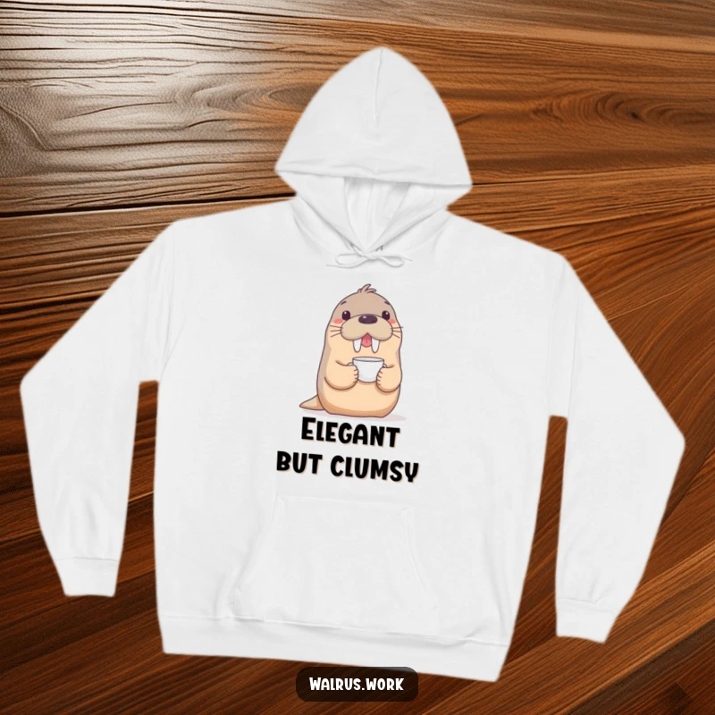Funny hoodie with a playful walrus balancing a delicate teacup on its snout, offering cozy comfort with a humorous, elegant design.