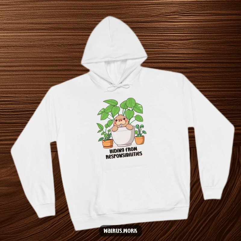Funny hoodie with a curious walrus peeking out from behind a big office plant, creating a humorous and cozy look.