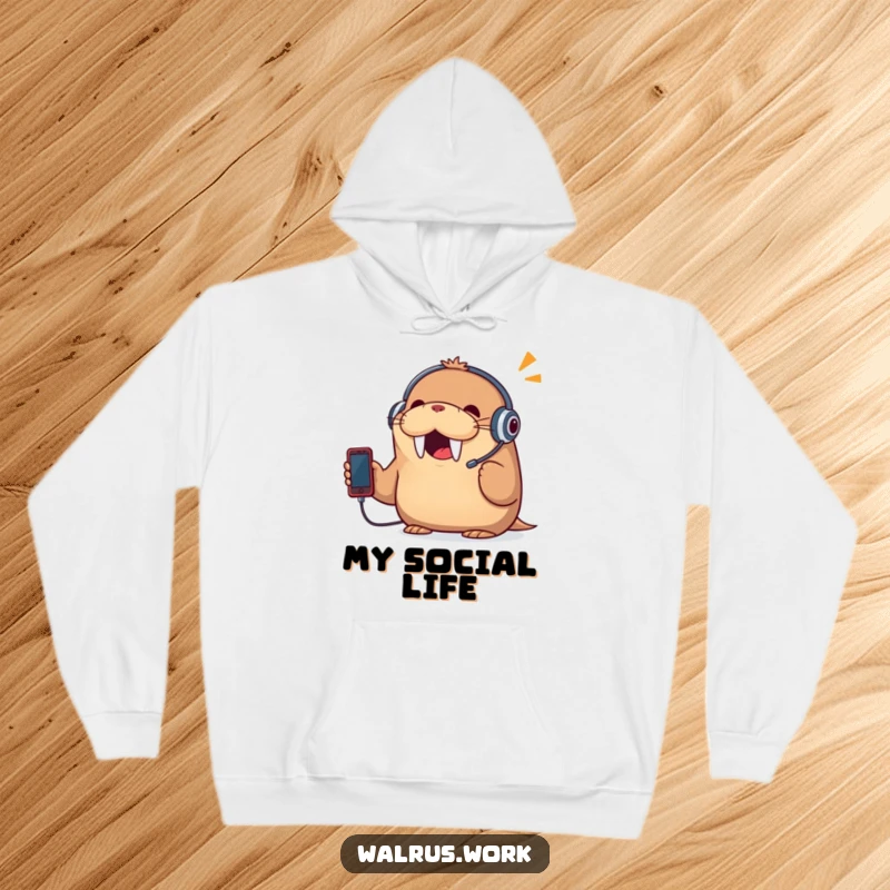 Funny hoodie featuring a cheerful walrus wearing a headset and talking animatedly on a tiny phone, perfect for cozy, humorous conversations.