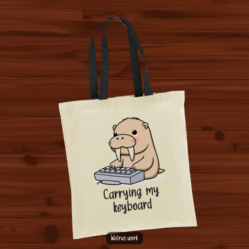 Funny tote bag showing a walrus playfully using its large tusks to type on a computer keyboard.
